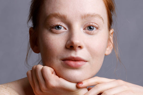 Portrait of a young woman with clean flawless skin 