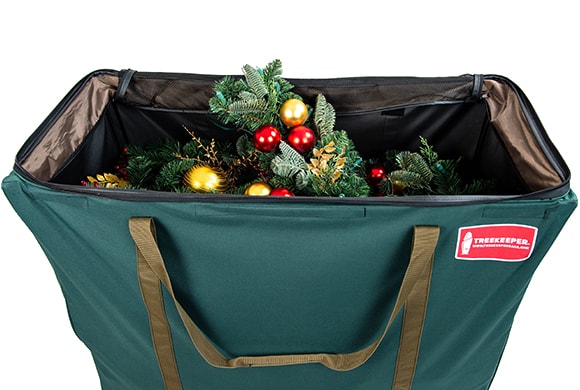 TreeKeeper Bags Big Wheel Multi-Use Storage Bag Full Of Christmas Wreaths And Garlands