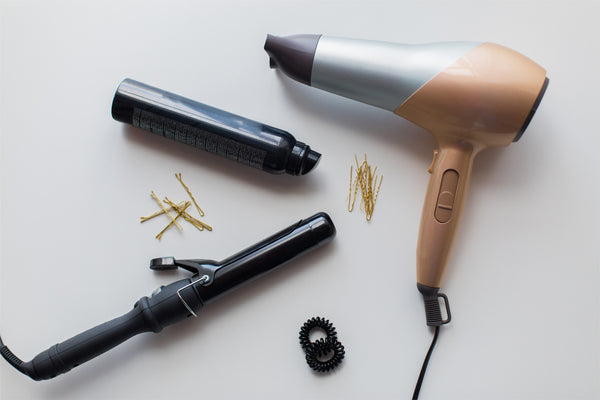 Heat styling tools and heat protectant hair spray