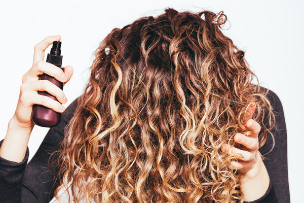 How to use hair spray for volume – flip your head!