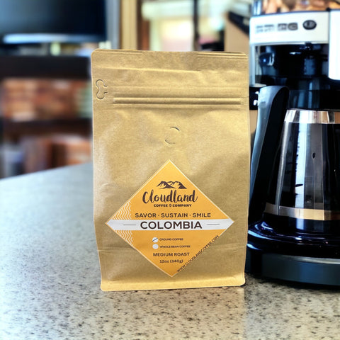 Cloudland Coffee Colombia coffee in a kitchen with a coffee maker