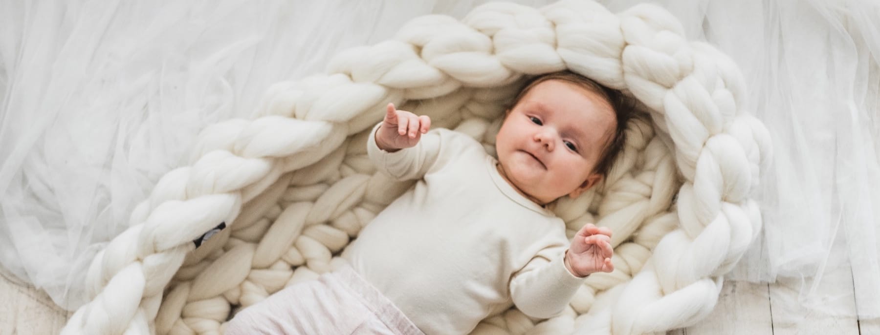 knitted baby nest white