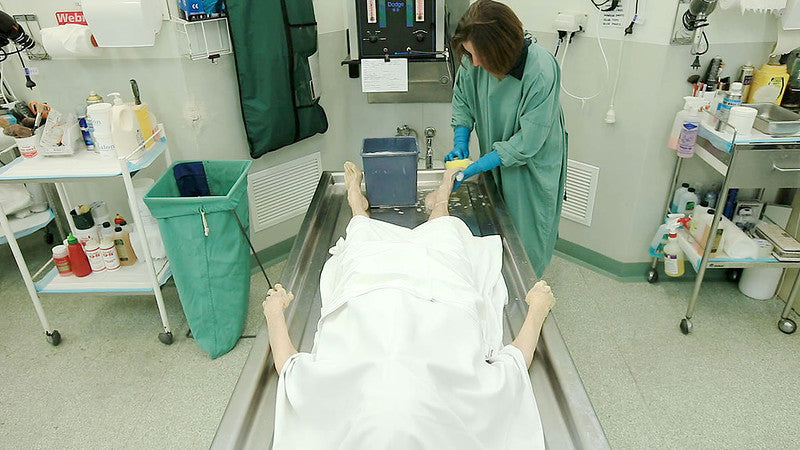 embalmed body in living room