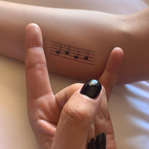 Lady Gaga's clever tattoo of five musical bars and the notes: g-a-g-a