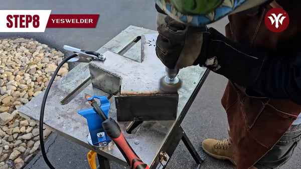 Use a wire wheel to clean up some welds.