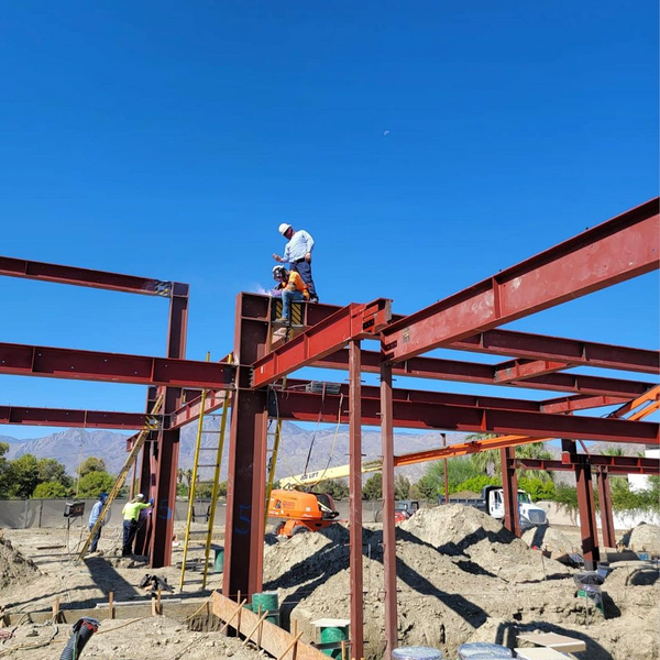 Construction welders welding at high height structure