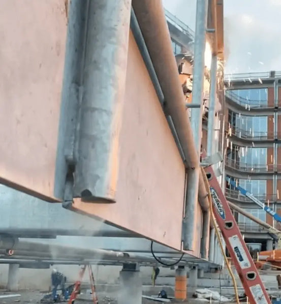 The smoke coming out of the galvanized steel pipes