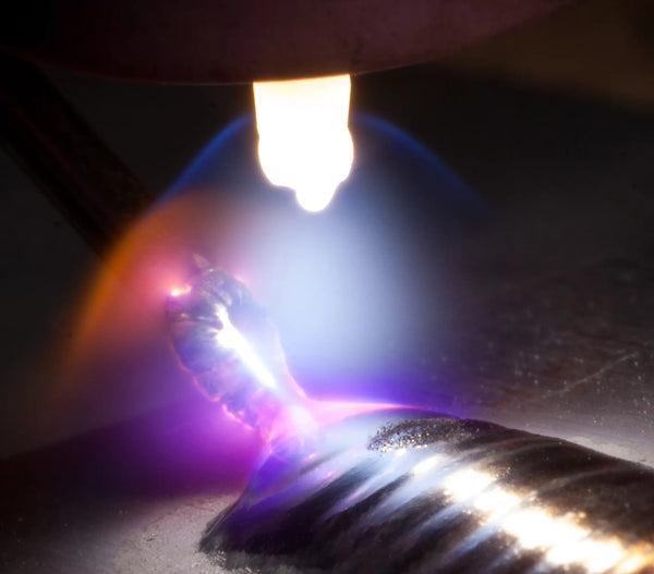 Close up of the TIG welding arc and the shielding umbrella of an argon welding gas