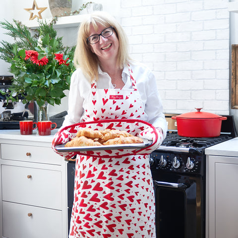 Chez Beccy, Chez Beccy apron, red heart apron, red shooting heart apron, red apron, sustainable homeware, kitchen linens, kitchen textiles, made in Britain, joy in every day moments, joy in every day tasks