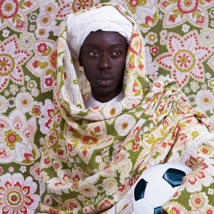 https://cdn.shopify.com/s/files/1/0024/6510/3929/articles/Photographer_Omar_Victor_Diop_a_Moroccan_man_diaspora_series_2014_F_736x736.jpg
