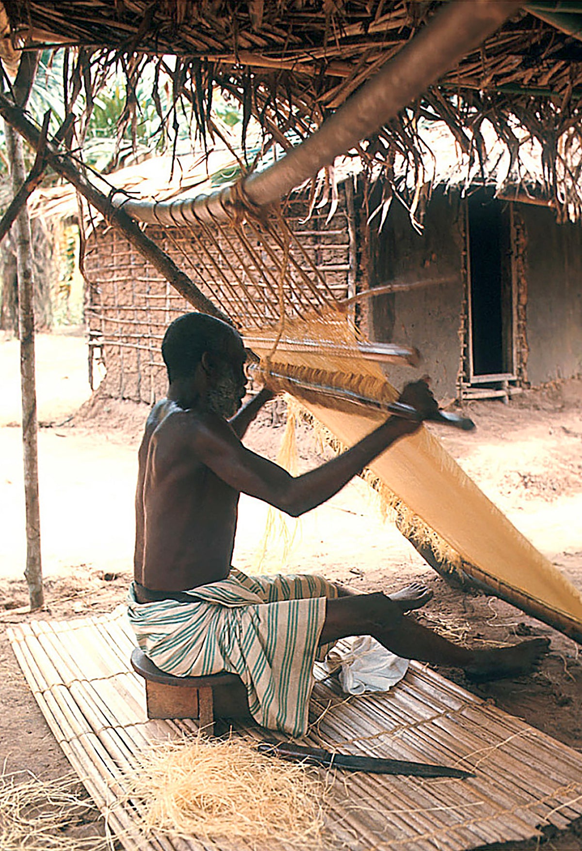 Safari Journal / Blog by Safari Fusion | African textiles / kuba cloth | Cloth weaver Nemwele Village, Democratic Republic of Congo | Photographer Eliot Elisofon via Smithsonian Institute
