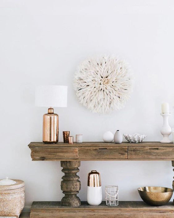 White on white | Beautiful entrance hall stying by Three Birds Renovations with a White Bamileke Feather Headdress