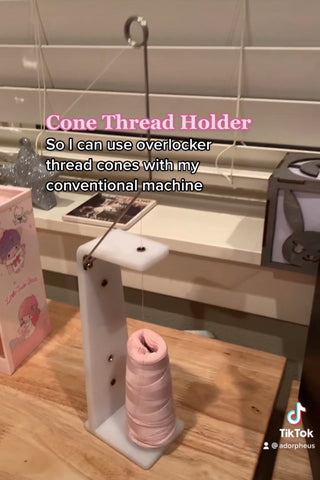 The Superior Thread Holder - a sewing tool that enables you to use cone spools on a conventional sewing machine