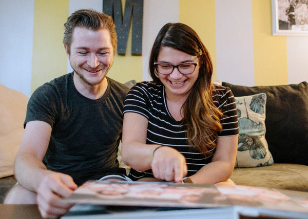 Couple Enjoying their Album