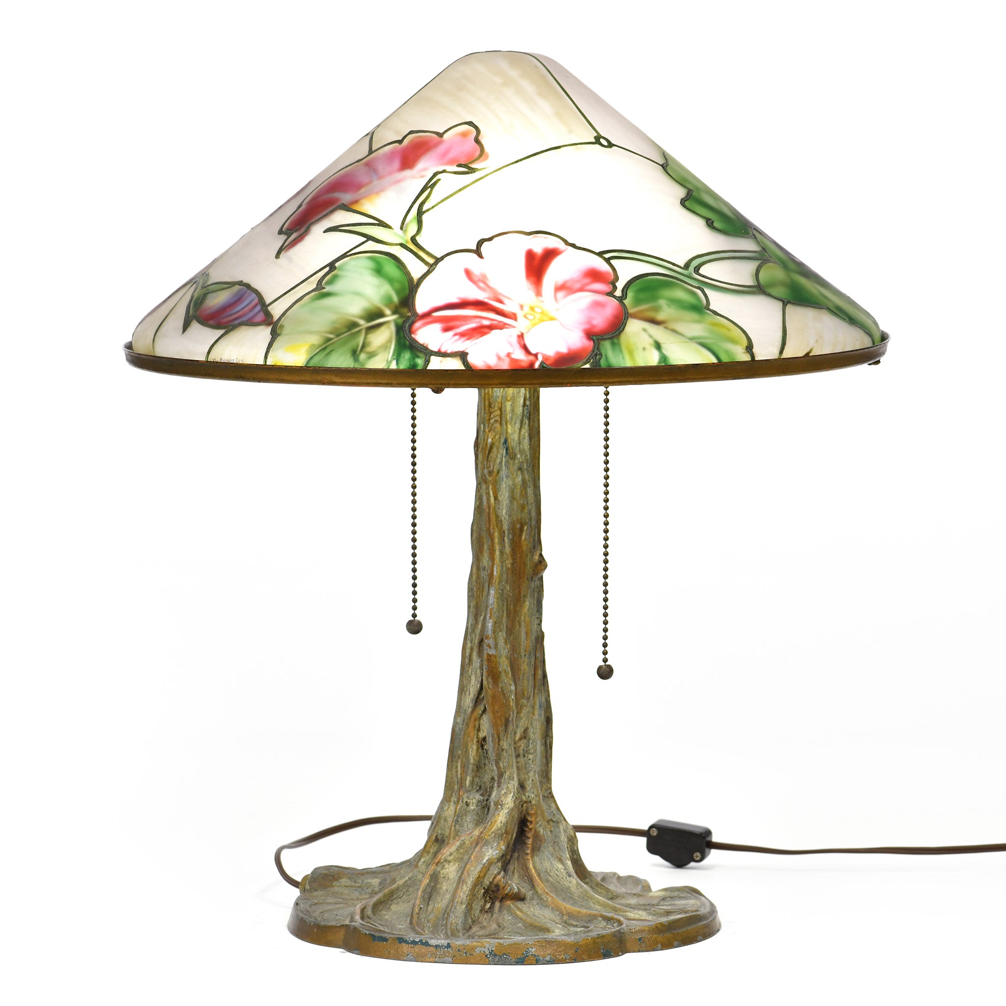 Elegant Pairpoint table lamp with intricate glass shade design.