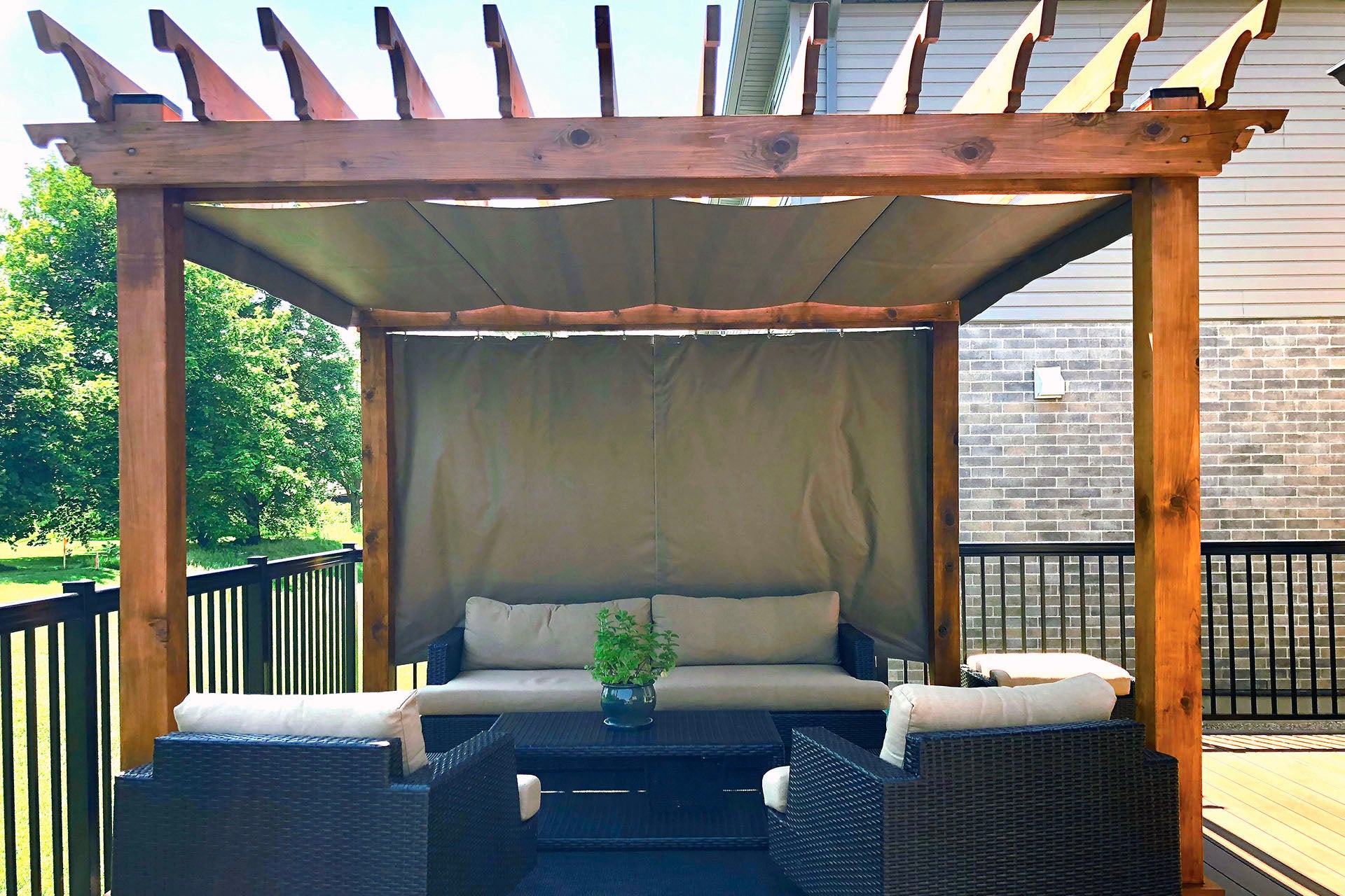 cozy pergola with retractable shade and curtain