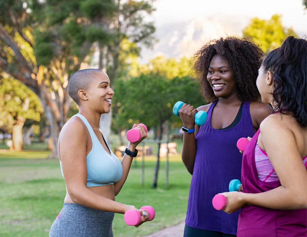 A Group of Women of Color Working out