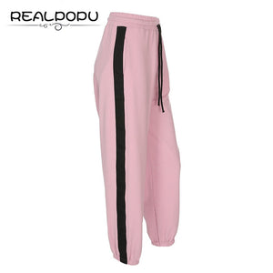 black joggers with pink stripe