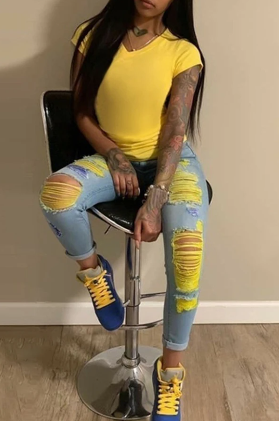 yellow ripped jeans