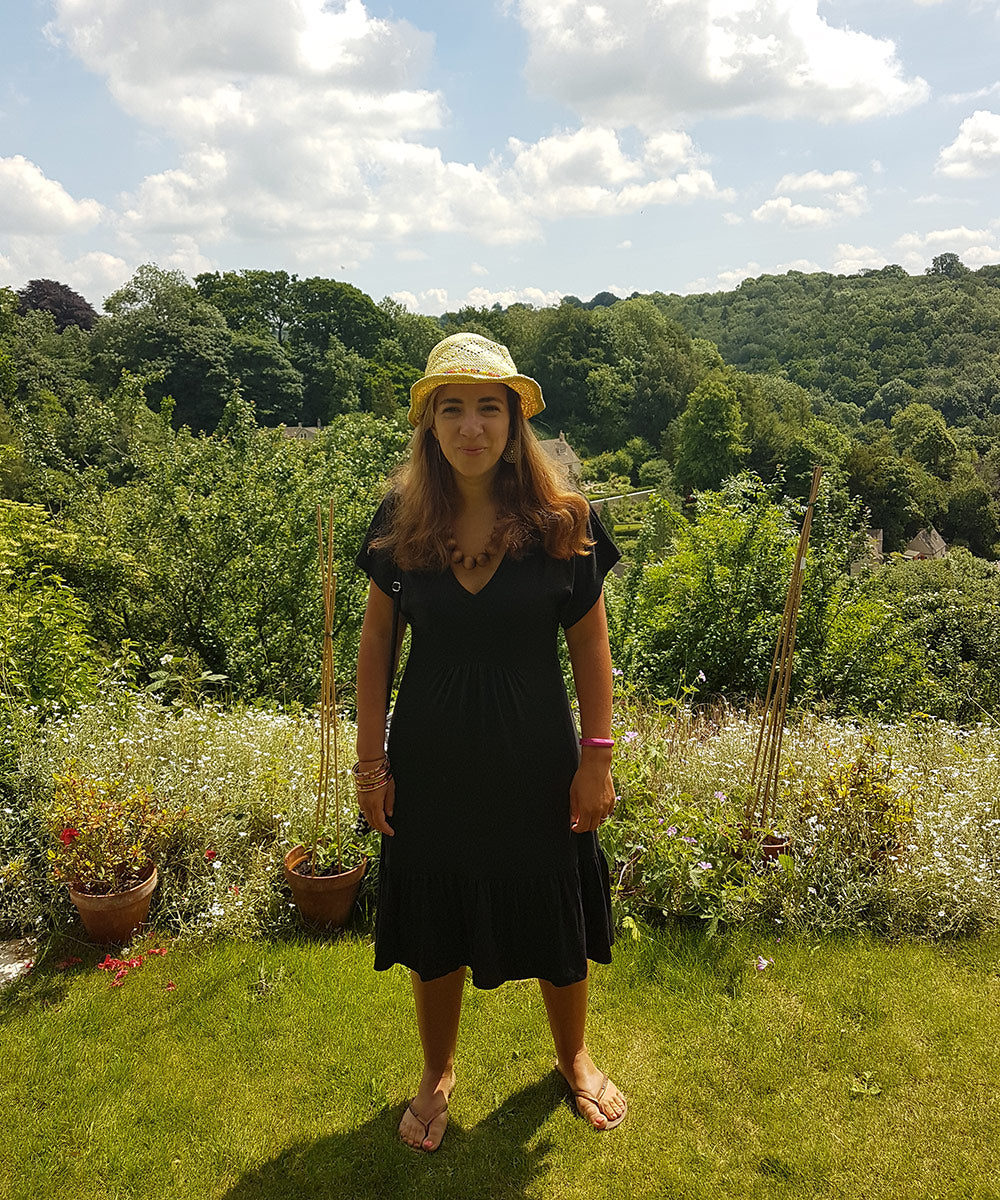 Writer Anna Brech in a garden