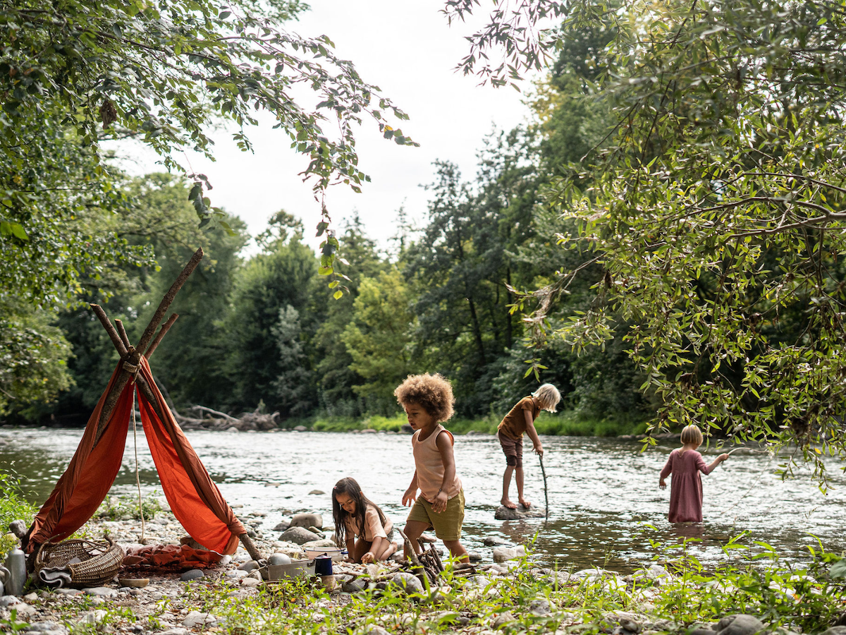 Children playing outside in nature
