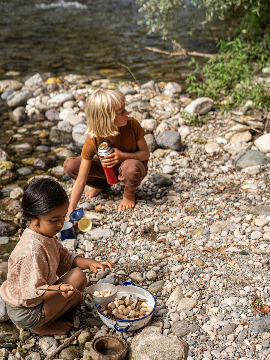 Children playing outside in nature