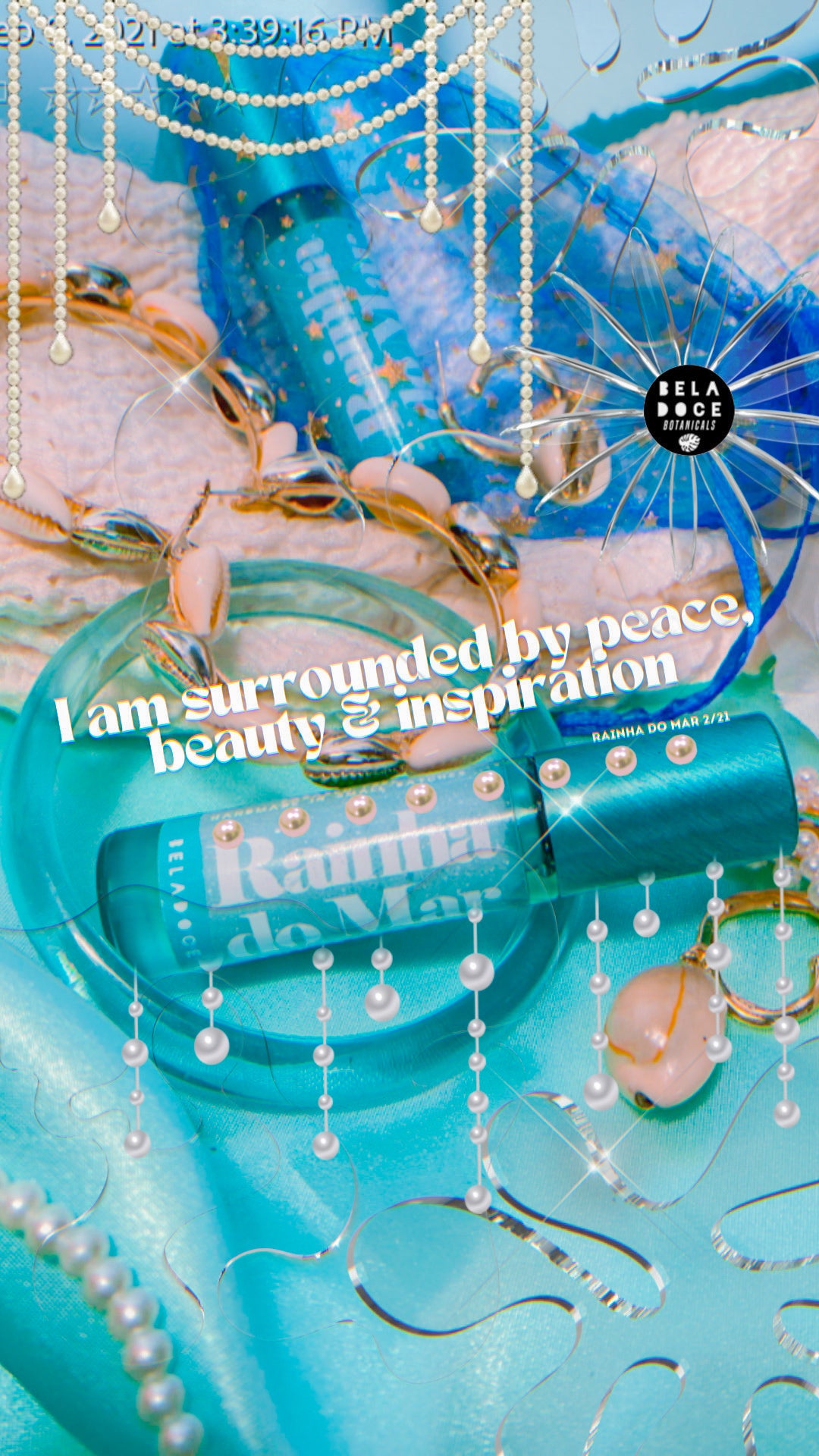 I am surrounded by peace beauty and inspiration. image description2020 photo by beladoce botanicals featuring a flatlay on turquoise satin, pearl clips necklaces and accessories, and two beladoce botanicals rainha do mar fragrance rollerballs