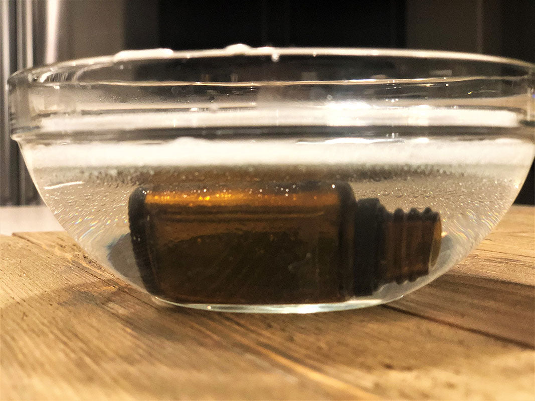 Removing label from essential oil bottle