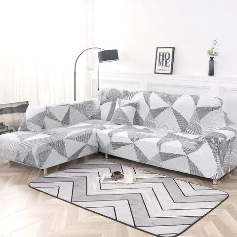 Housse canapé extensible couleur gris blanc motif géométrique