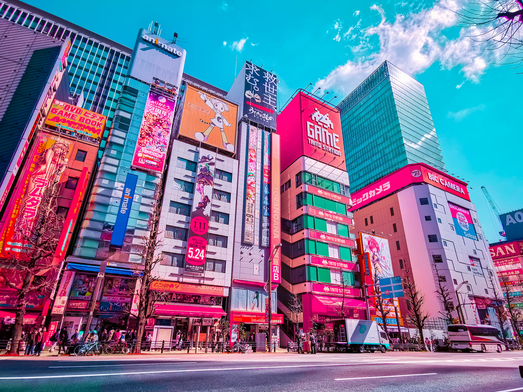 A Tokyo street with many colorful billboards. 