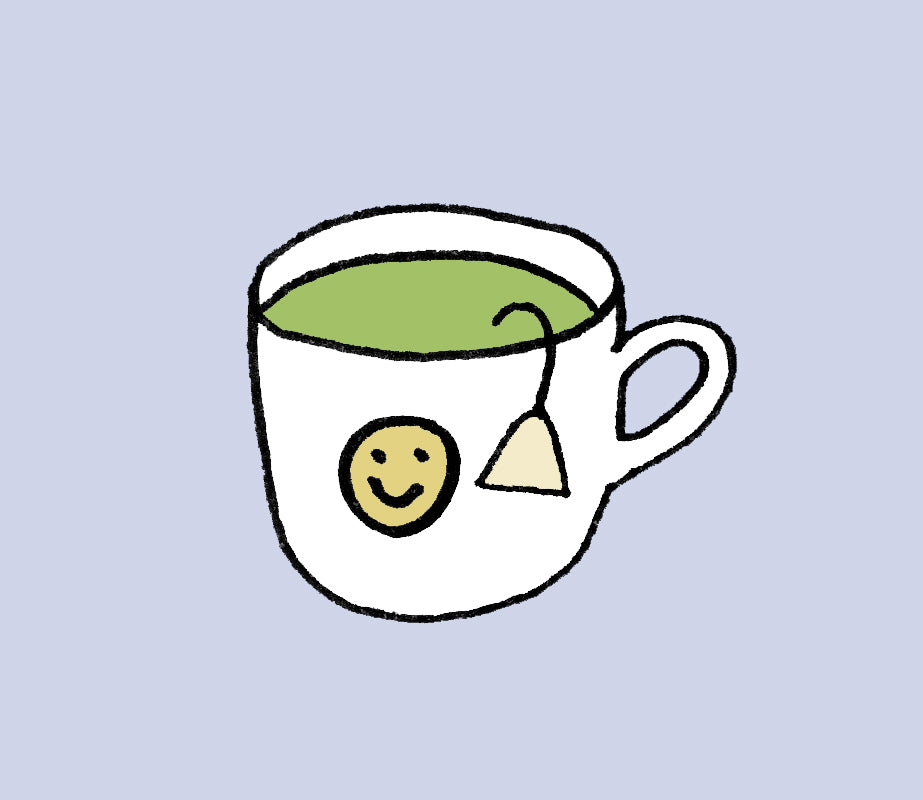 A drawing of a cup of green tea with a smiley face on the side. 