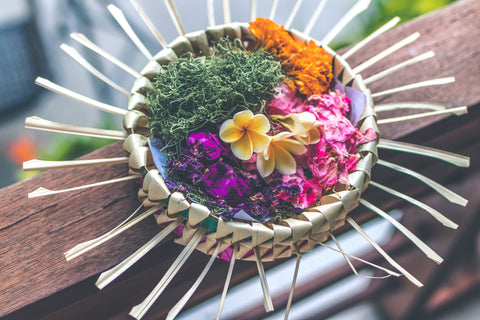 Balinese traditional offerings are multicolored floral decor. Part of Bali's sacred tradition, it amazes tourists. 
