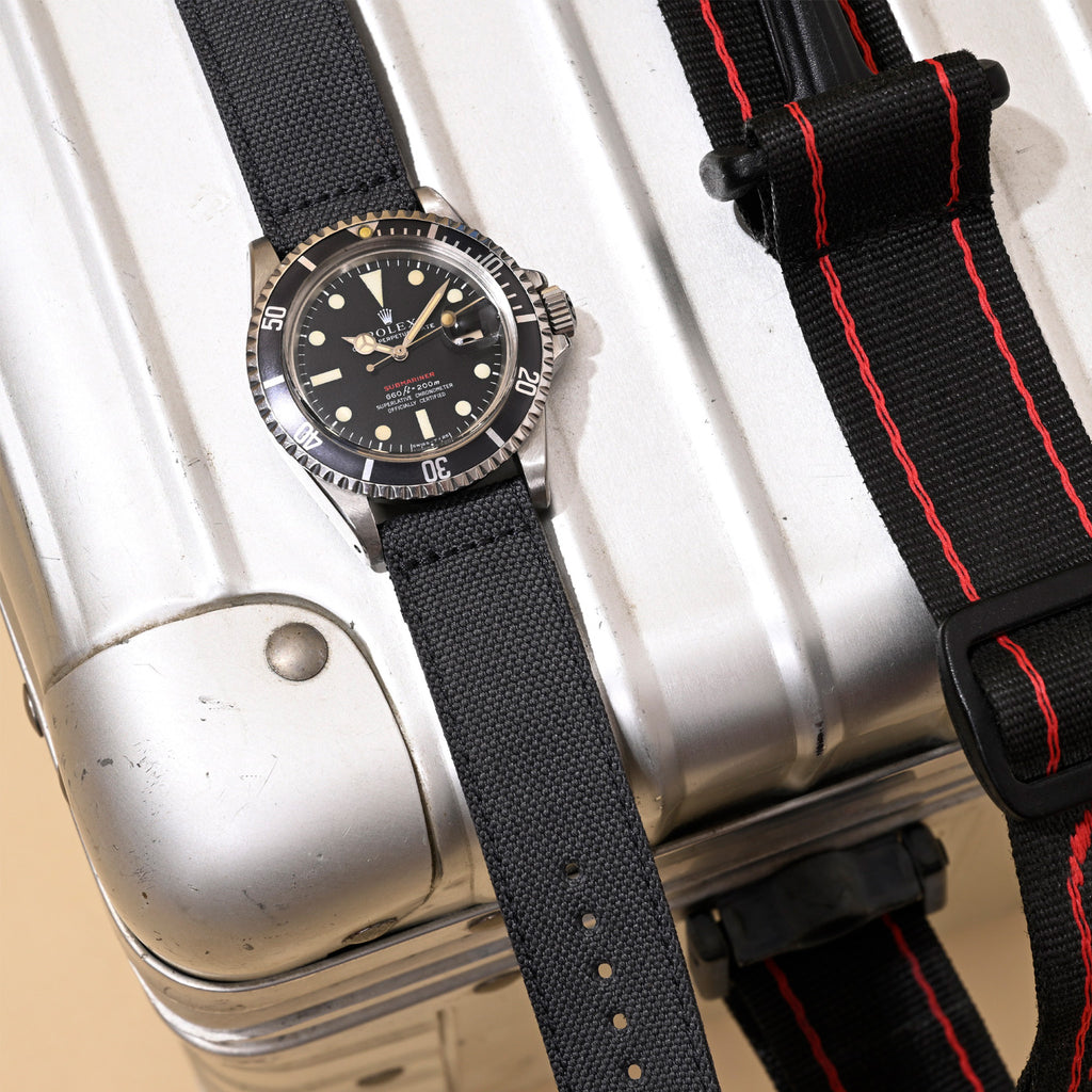 Rolex Red Submariner with Canvas Strap on Vintage Rimowa case