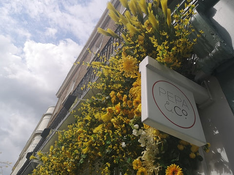 Belgravia in Bloom Pepa & Co. Shop Front Sky Yeloow and White Flowers