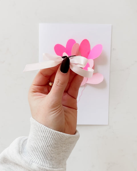 Add a bow to finish your card Mother's Day Heart Card