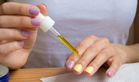 Using a glass cuticle pusher step1 using a cuticle softener