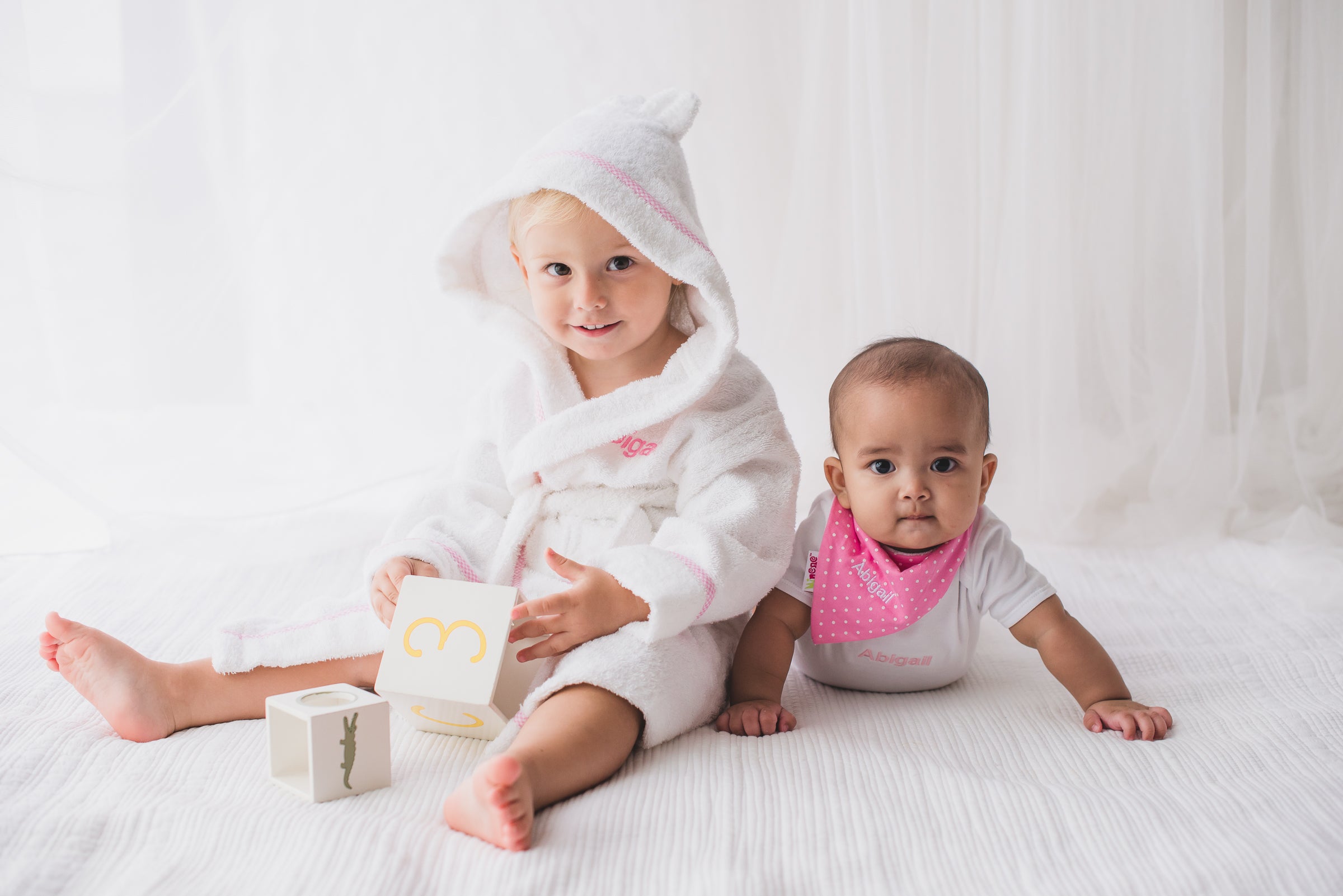baby girls in personalized bath robes from lovingly signed hong kong