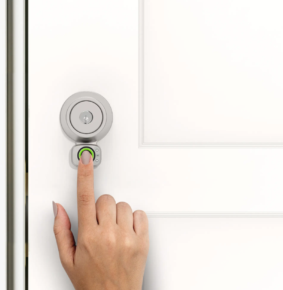 A person using a Lockly Flex Touch Pro retrofit smart lock.