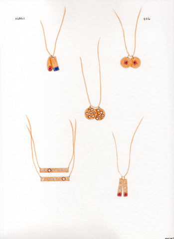 Our sketches for Mani all riffed on the concept of layering charms and necklaces. 