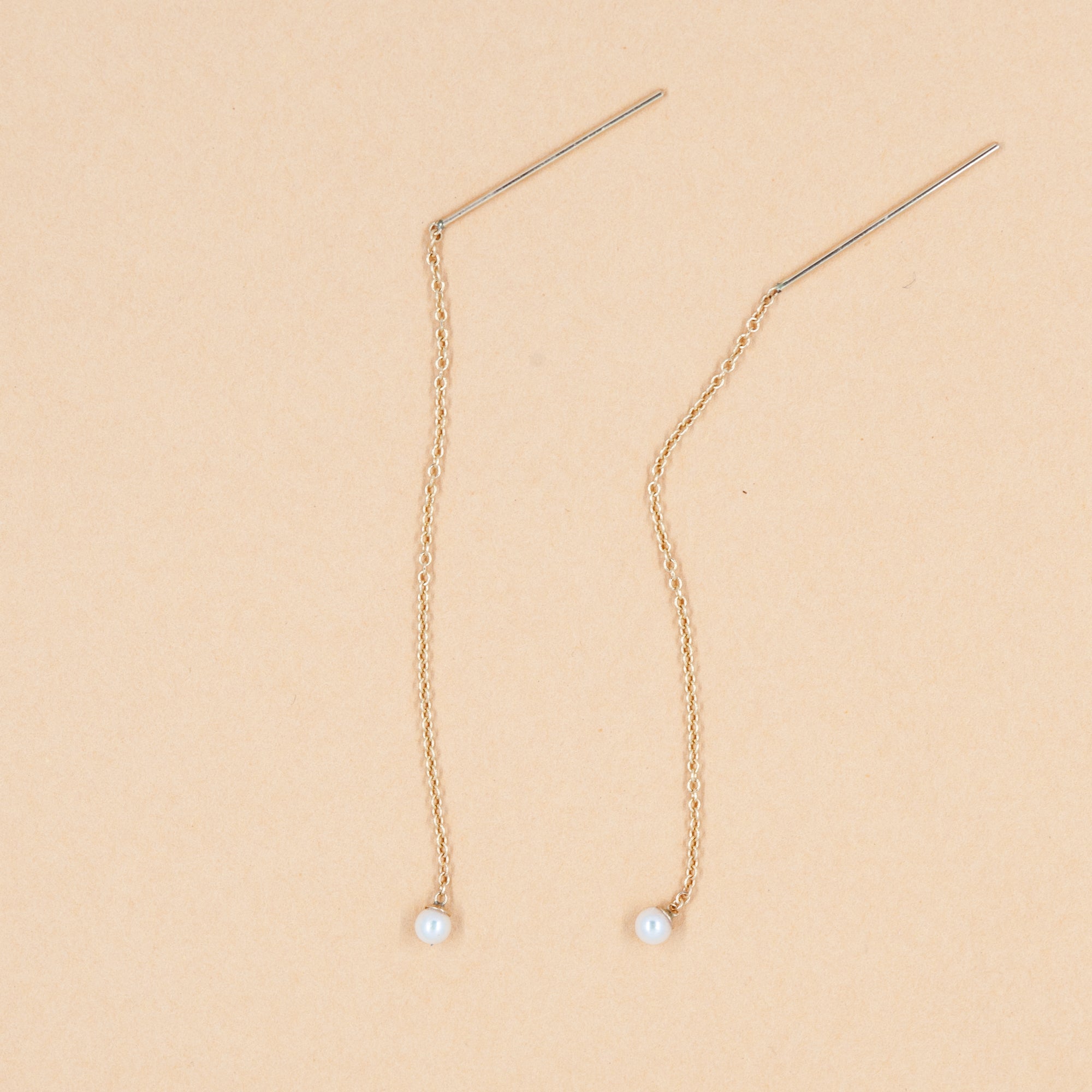 Delicate pearl pull-throughs from our collection.
