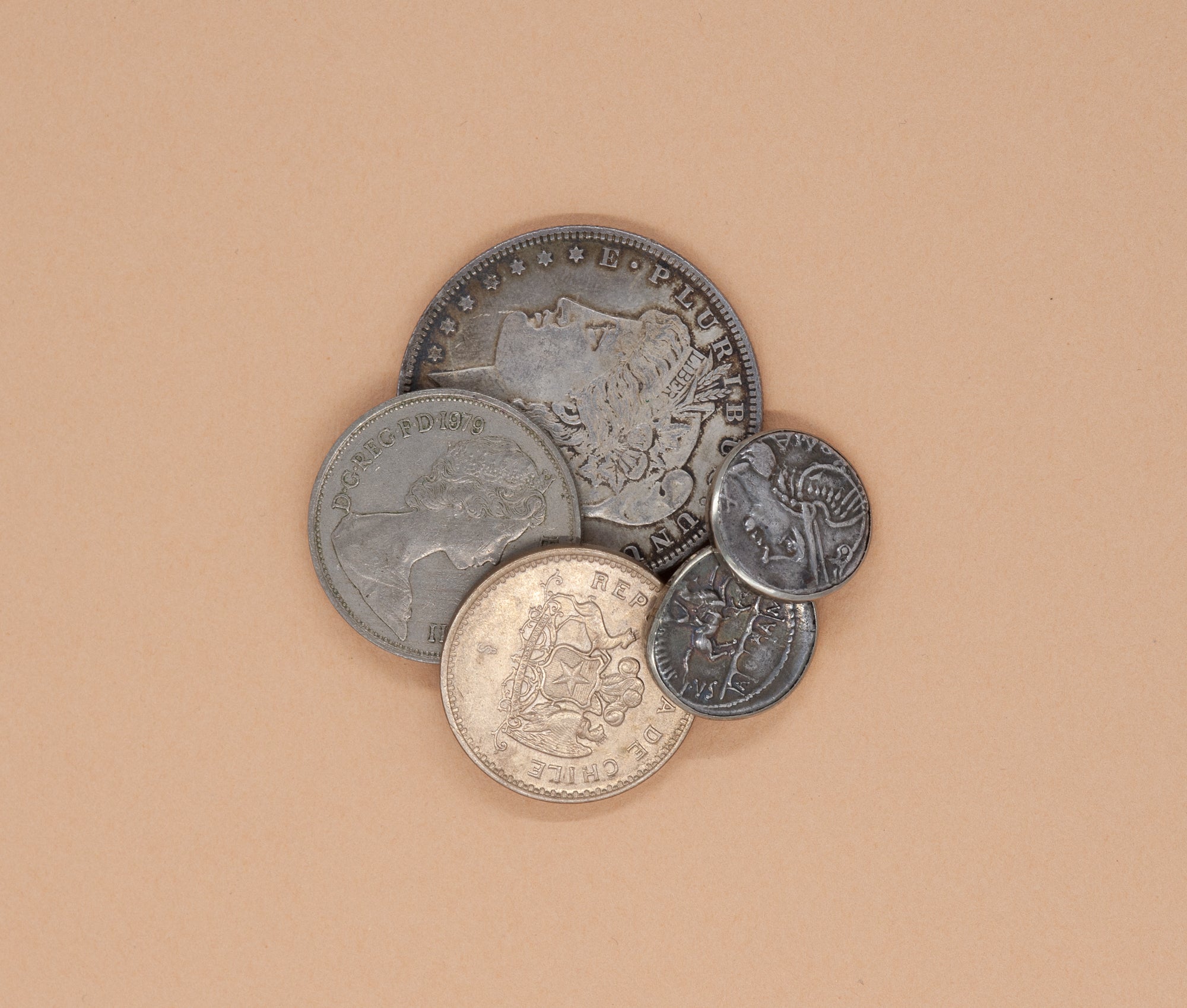 Miscellaneous coins in our studio awaiting re-purposing.