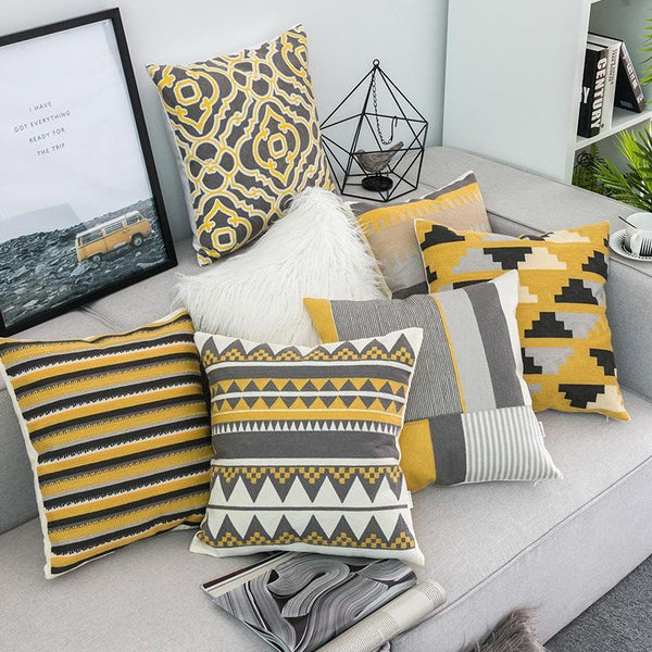 yellow and grey pillow covers