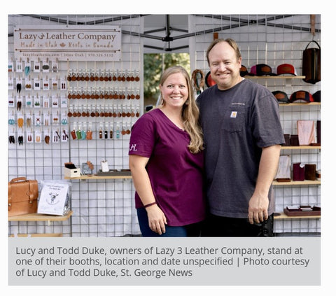 Todd and Lucy Duke of Lazy 3 Leather company in front of their booth in St. George Utah at the Downtown Farmers Market 2021