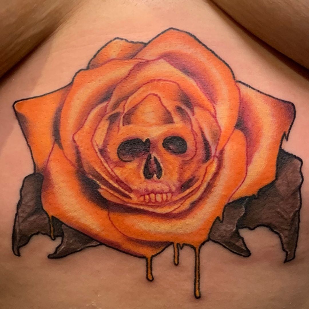 Skull and Lilies Flowers Tattoo Design – Tattoos Wizard Designs
