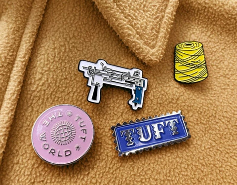 tuft the world enamel pins for holiday gift guide