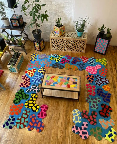 wes bechtler living room with tufted rugs