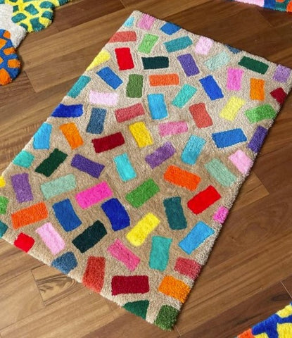 rectangular multi-color rug tufted by wes bechtler