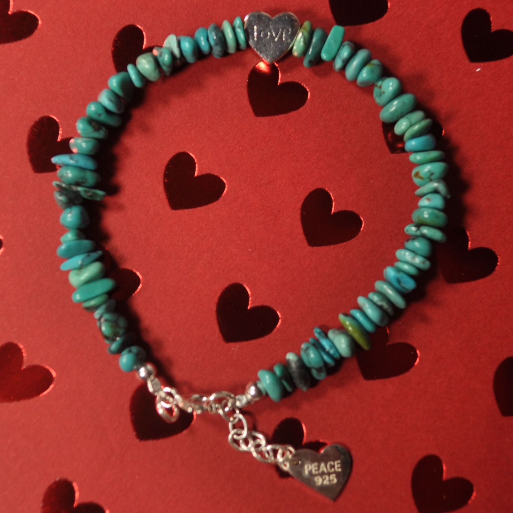 silver bead bracelet with heart charm