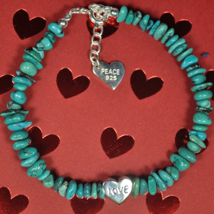 silver bead bracelet with heart charm