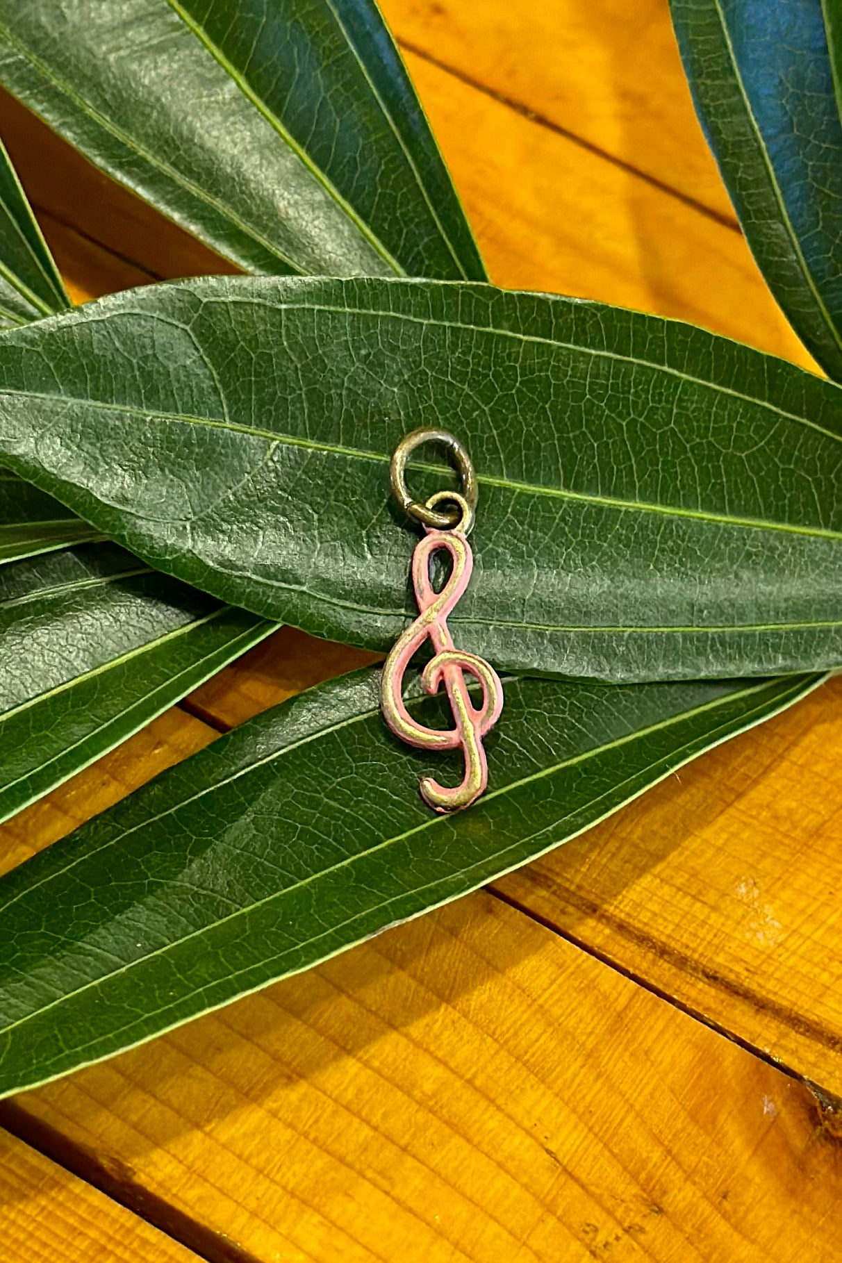 Gleeful Peacock Charm: Treble Clef